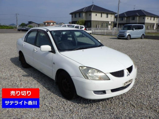 MITSUBISHI LANCER — фото